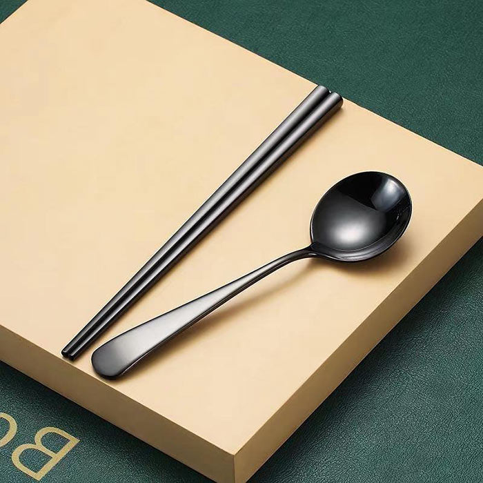 Cuillère Et Baguettes Chinoises Noires