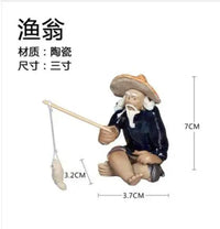 figurine-chinoise-p-cheur-avec-rocher