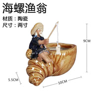 figurine-chinoise-p-cheur-avec-rocher