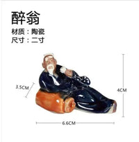 figurine-chinoise-p-cheur-avec-rocher