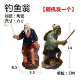 figurine-chinoise-p-cheur-avec-rocher