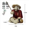 figurine-chinoise-p-cheur-avec-rocher