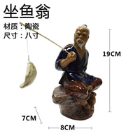 figurine-chinoise-p-cheur-avec-rocher