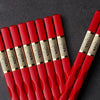 Baguettes Chinoises En Plastique Rouges