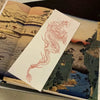 tatouage-dragon-chinois-rouge-tanche