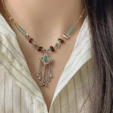 collier-chinois-style-ruyi-pompon