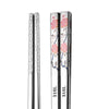 baguettes-chinoises-acier-fleurs-de-cerisier