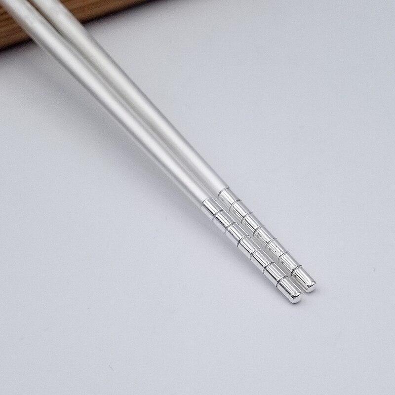 baguettes-chinoises-en-argent