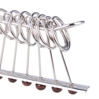 casse-tete-chinois-anneau-metal
