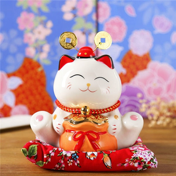 chat-chinois-avec-bras-mobile